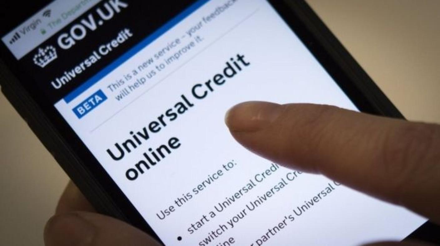 A mobile smart phone on the universal credit home page