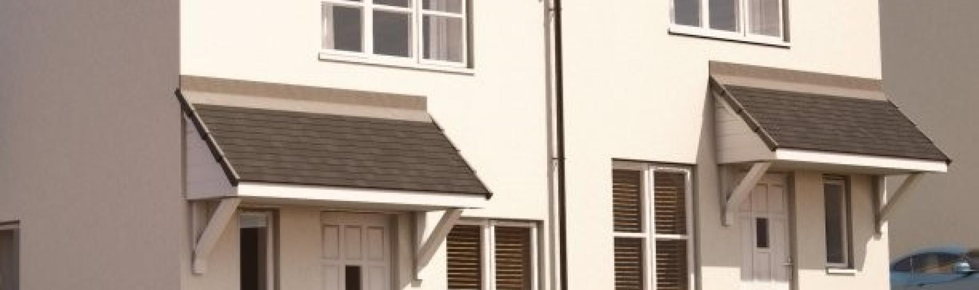 An illustrative CGI image of 2x semi-detached houses