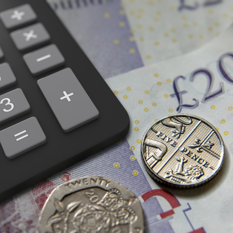 Calculator with bank notes and coins