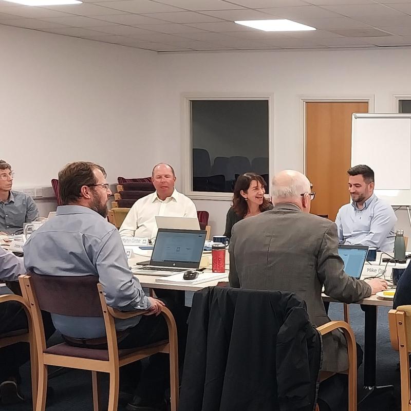 Board meeting around a table